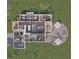 Open-concept floor plan with a spacious living area, modern kitchen, multiple bedrooms, and an outdoor patio at 8259 Tracy Cir, Port Charlotte, FL 33981