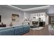 Contemporary living space featuring a well-appointed kitchen with a center island and dining area at 8259 Tracy Cir, Port Charlotte, FL 33981