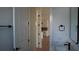 Stylish bathroom with white cabinets, modern hardware and a marble countertop at 2604 E 11Th Ave, Tampa, FL 33605