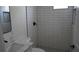 Clean, updated bathroom featuring tile shower, marble sink, and modern fixtures at 2604 E 11Th Ave, Tampa, FL 33605