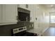 Updated kitchen features modern appliances, granite countertops and stylish cabinets at 2604 E 11Th Ave, Tampa, FL 33605