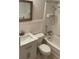 Cozy bathroom with a shower-tub combo, stylish vanity, and marble countertop at 4143 57Th N St # 502, Kenneth City, FL 33709