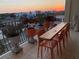 Outdoor balcony with sunset views and dining table with seating for six at 750 4Th S Ave # 601H, St Petersburg, FL 33701