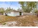 Expansive backyard featuring a wood deck and privacy fence, ideal for outdoor activities at 2260 Bay Se St, St Petersburg, FL 33705