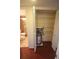Walk in closet with water heater and storage shelving at 6026 22Nd N Ave # 4, St Petersburg, FL 33710