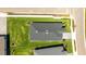 Birds-eye view of a home with a roof, fenced yard, and well-manicured lawn, nestled in a neighborhood at 16397 Preservation Blvd, Punta Gorda, FL 33982
