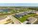 Serene aerial view of the community, showcasing modern homes, manicured lawns, and green spaces at 16397 Preservation Blvd, Punta Gorda, FL 33982
