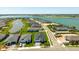 Lovely aerial perspective of the community featuring well-manicured lawns and lake views, offering a serene living environment at 16397 Preservation Blvd, Punta Gorda, FL 33982