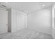 Clean bedroom featuring a closet, plush carpeting, and a window for natural light at 16397 Preservation Blvd, Punta Gorda, FL 33982