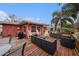 Charming backyard featuring a spacious deck, perfect for outdoor gatherings at 1768 Suffolk Dr, Clearwater, FL 33756