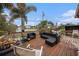 Spacious wooden deck overlooking water, perfect for outdoor entertaining and relaxation at 1768 Suffolk Dr, Clearwater, FL 33756