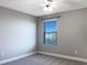 Empty bedroom featuring carpet at 6113 Shadowlake Dr, Apollo Beach, FL 33572