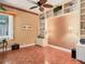 Spacious bedroom with built in shelves and a large window showing green outside at 5011 88Th E St, Bradenton, FL 34211