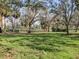 Scenic view of a well-maintained golf course and beautiful mature trees at 5011 88Th E St, Bradenton, FL 34211