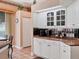 Cozy kitchen features white cabinets, granite counter tops, and stainless steel appliances at 5011 88Th E St, Bradenton, FL 34211
