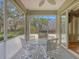 Relaxing screened patio with seating, perfect for enjoying outdoor views and fresh air at 5011 88Th E St, Bradenton, FL 34211