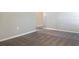 Bedroom with neutral carpeting and walls, showcasing a clean and simple design at 14853 Crescent Rock Dr, Wimauma, FL 33598