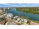 Beautiful waterfront home with boat dock and stunning views of the surrounding area at 318 182Nd E Ave, Redington Shores, FL 33708