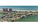 Charming waterfront home with a dock in a vibrant coastal community at 318 182Nd E Ave, Redington Shores, FL 33708