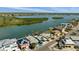 Waterfront properties offer serene living with views of calm waters and lush green landscapes at 318 182Nd E Ave, Redington Shores, FL 33708