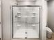 New bathroom features glass-enclosed shower with built-in shelving at 36880 Precita Ter, Zephyrhills, FL 33542