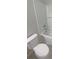 A view of the modern tiled shower and toilet in the bathroom at 36880 Precita Ter, Zephyrhills, FL 33542