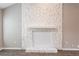 Close up view of the bright stone fireplace in the living room; features a stone mantel at 10221 N Oklawaha Ave, Tampa, FL 33617