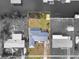 Black and white aerial view of the property with canal access at 511 Sharon Cir, Port Charlotte, FL 33952
