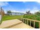 Spacious backyard with a lush lawn and a private dock at 511 Sharon Cir, Port Charlotte, FL 33952