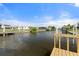 Canal view from new dock and landscaped lawn at 511 Sharon Cir, Port Charlotte, FL 33952