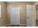 Empty bedroom showing closet and doorway at 2634 E 38Th Ave, Tampa, FL 33610