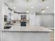 Beautiful kitchen featuring granite counters, stainless appliances, and a large island for entertaining at 6731 Ranger Dr, Tampa, FL 33615