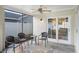 Cozy screened-in patio with seating area and a stylish outdoor rug at 6731 Ranger Dr, Tampa, FL 33615