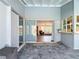 Large sliding glass doors open to the outdoor living space at 7525 Sundial Ter, Sarasota, FL 34231