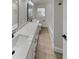 Updated bathroom featuring double sinks, quartz counters, and modern fixtures at 2642 49Th N St, St Petersburg, FL 33710