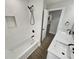 This refreshed bathroom includes a tub and shower at 2642 49Th N St, St Petersburg, FL 33710