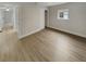 An airy bedroom has modern flooring and a closet for storage at 2642 49Th N St, St Petersburg, FL 33710