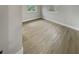 A clean, bright bedroom featuring modern flooring and neutral paint at 2642 49Th N St, St Petersburg, FL 33710