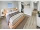 Cozy main bedroom with a comfortable bed, closet space, and soothing decor at 2642 49Th N St, St Petersburg, FL 33710