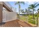 Scenic backyard view with lush greenery and serene lake at 4324 Spinnaker Cove Ln, Tampa, FL 33615