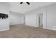 Open bedroom with carpeted floors and painted light grey walls at 4324 Spinnaker Cove Ln, Tampa, FL 33615