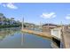 Picturesque view of a boat slip on the water, showing nearby waterfront homes at 4324 Spinnaker Cove Ln, Tampa, FL 33615