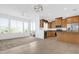 Bright and open kitchen featuring stainless steel appliances, granite countertops, and ample cabinet space at 4324 Spinnaker Cove Ln, Tampa, FL 33615