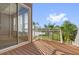 Private outdoor patio with scenic views and sliding glass doors at 4324 Spinnaker Cove Ln, Tampa, FL 33615