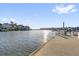 Beautiful waterfront view from the dock, showcasing nearby houses and stunning water views at 4324 Spinnaker Cove Ln, Tampa, FL 33615
