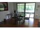 Dining area with wood floors, table and chairs at 4375 Neff Lake Road, Brooksville, FL 34601