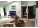 Cozy living room with lots of natural light, neutral tones, and a view of the backyard at 4375 Neff Lake Road, Brooksville, FL 34601