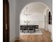 Stylish dining room with chandelier, large table, and wainscoting at 1056 Snell Isle Ne Blvd, St Petersburg, FL 33704