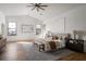 Serene main bedroom boasts vaulted ceilings, large windows, hardwood floors, and neutral décor for relaxation at 1056 Snell Isle Ne Blvd, St Petersburg, FL 33704