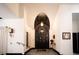 Elegant foyer with unique ceiling detail, black trim, and natural light at 7705 Weeping Willow Cir, Sarasota, FL 34241